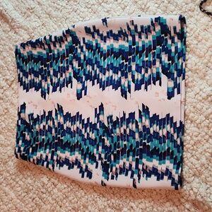 Blue on white geometric design scuba skirt.
